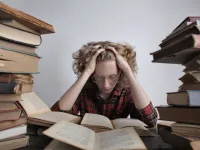 Smart teenager reading book at table 3853300 1